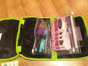I've got my nail utensils, polish remover pads, my Jamberry wraps, and my mini heater (right side in straps, with the cord in the left hand pocket) all neatly organized in my Bundle ready at a moment's notice!